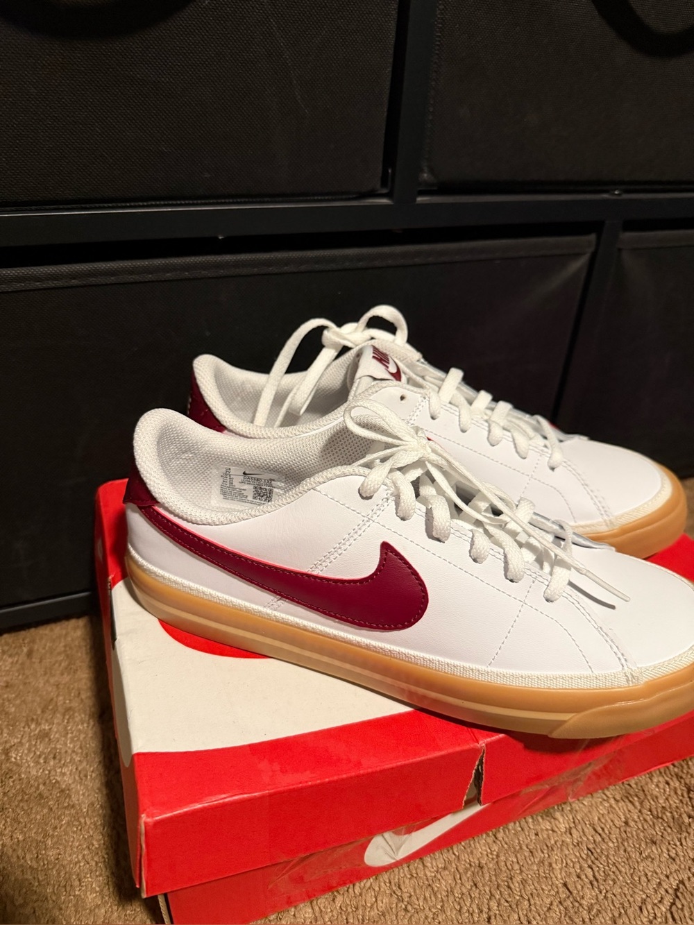 Nike White Low-Top Sneakers with Burgundy Swoosh and Gum Sole
